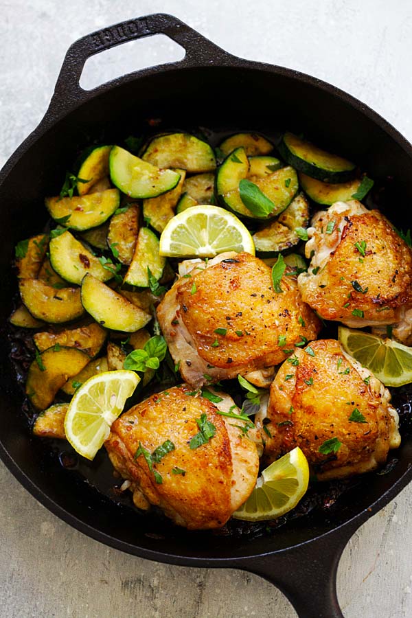 Homemade Garlic Herb Chicken and Zucchini cooked in a skillet.