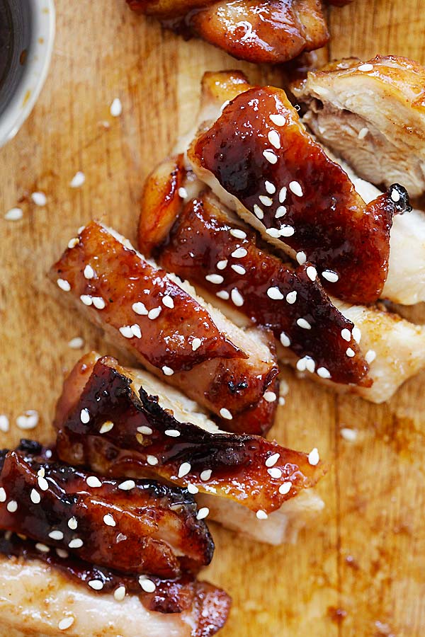 Sliced Char Siu Chicken topped with sesame seeds.