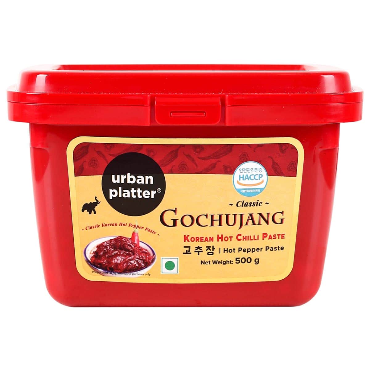 Korean Gochujang hot pepper paste in a tub. 