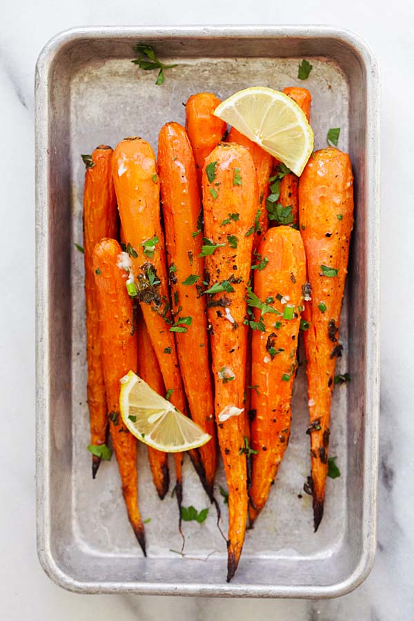 Lemon Herb roasted carrots recipe with lots of thyme, oregano, parsley and lemon juice.