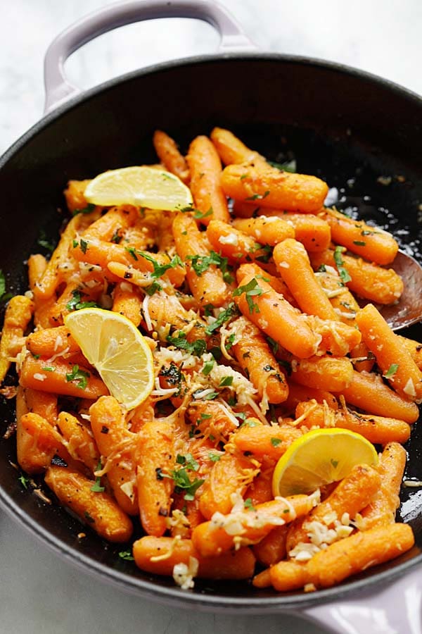 Quick and delicious Roasted Lemon Parmesan Roasted Carrots in a skillet ready to serve.