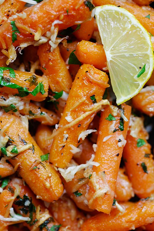 Close up Roasted carrots with lemon and Parmesan cheese.