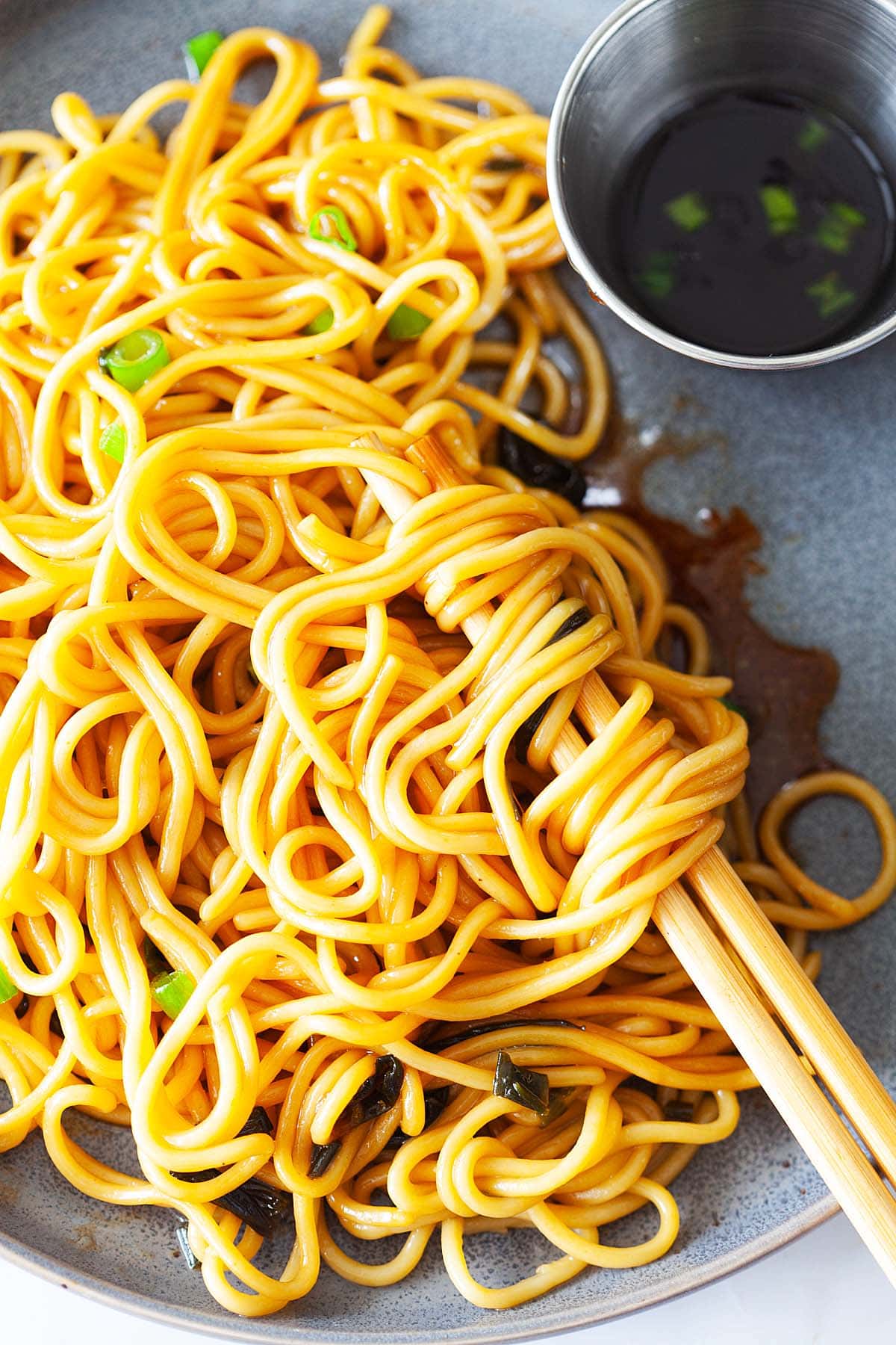 Easy scallion noodles served on a plate.