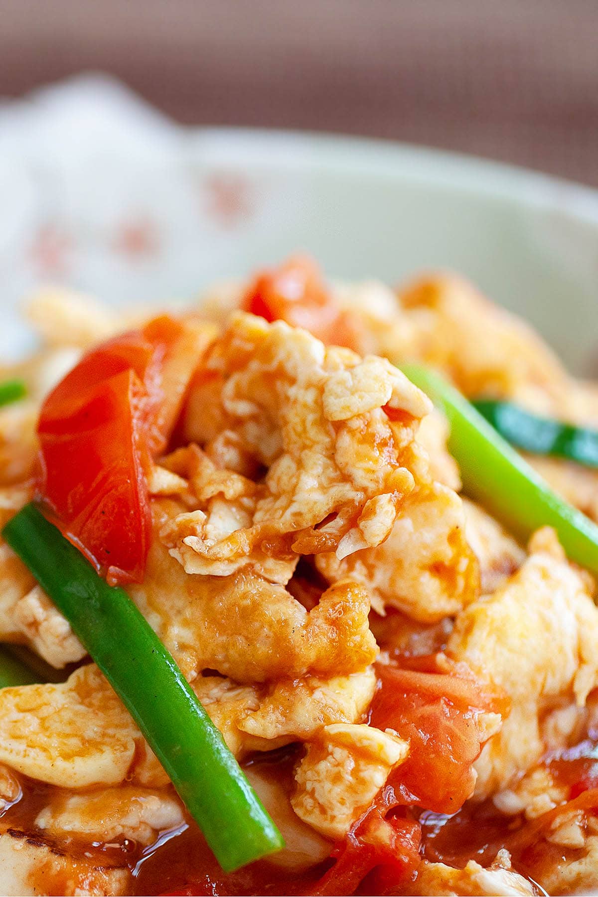 Tomato egg and tofu with scallion. 