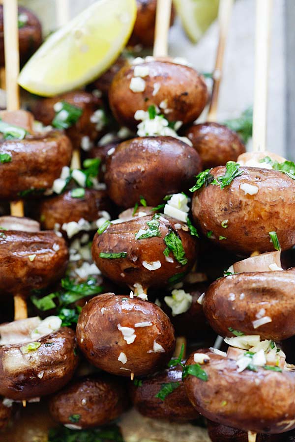 Healthy and easy grilled mushrooms on bamboo skewers.