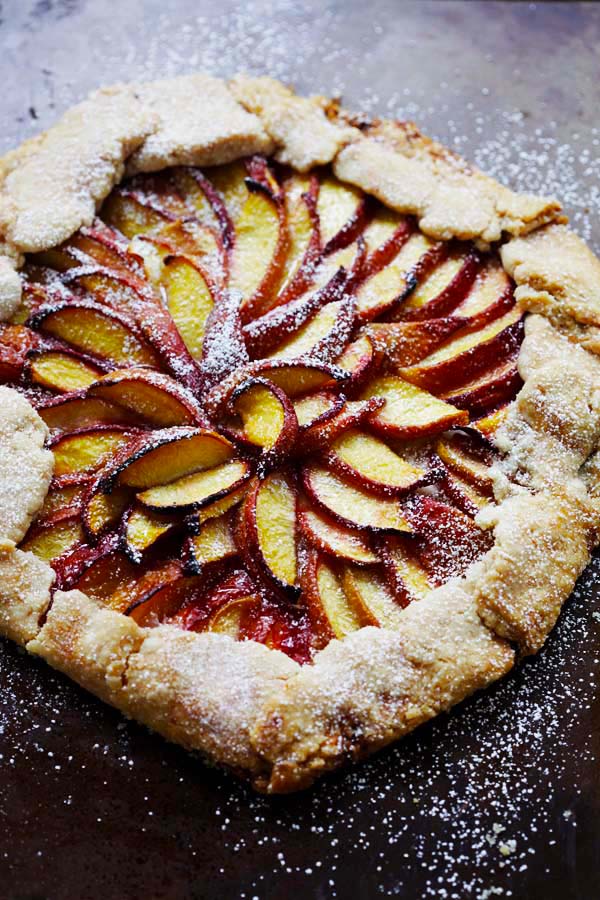 Baked peach tart with flaky pie crust.