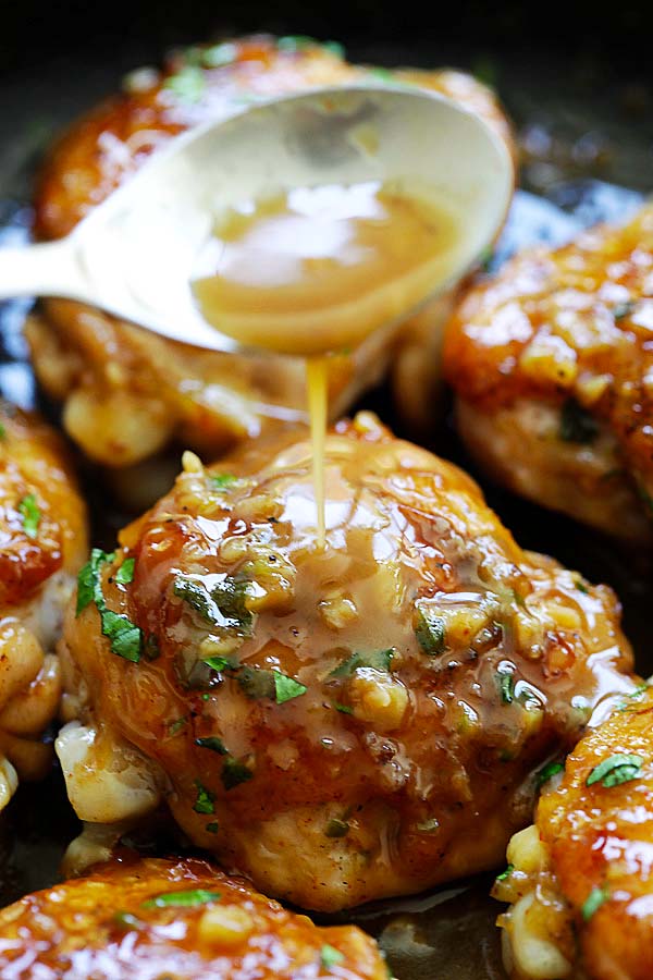 Garlic Chicken with sweet garlic sauce, topped with chopped parsley.