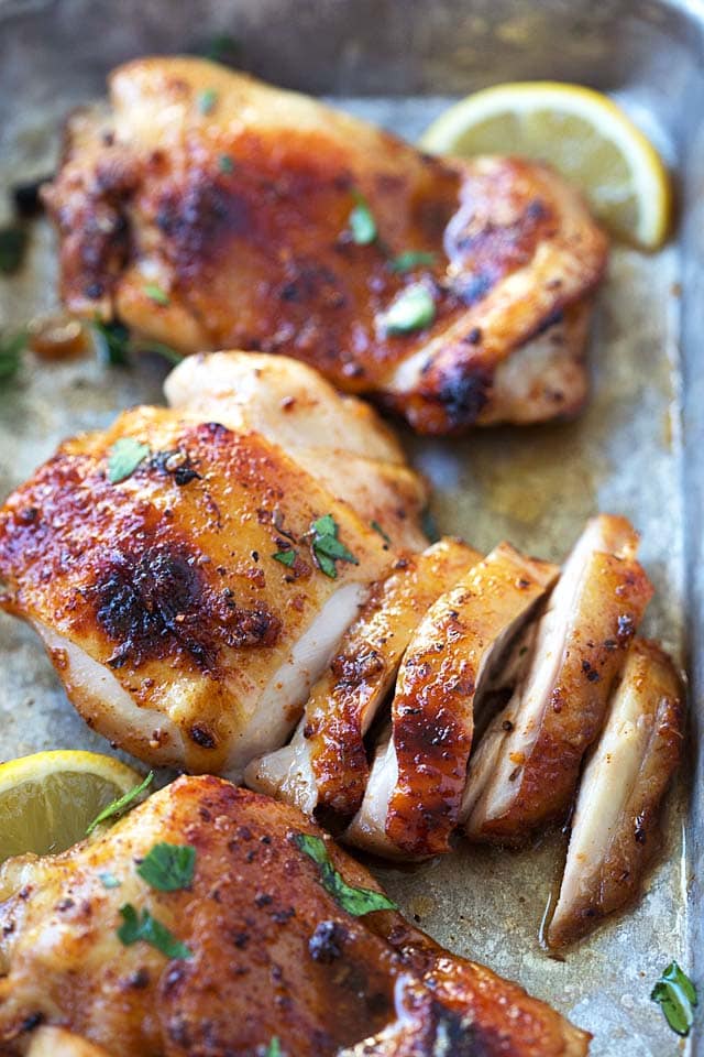 Juicy and moist baked chicken thighs with Cajun spices. 