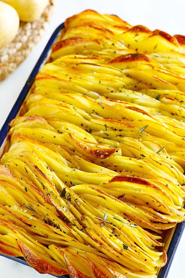 Crispy baked leaf potatoes with butter.