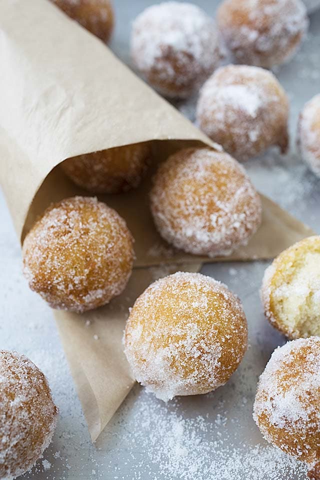 Easy donut holes coated with fine sugar.