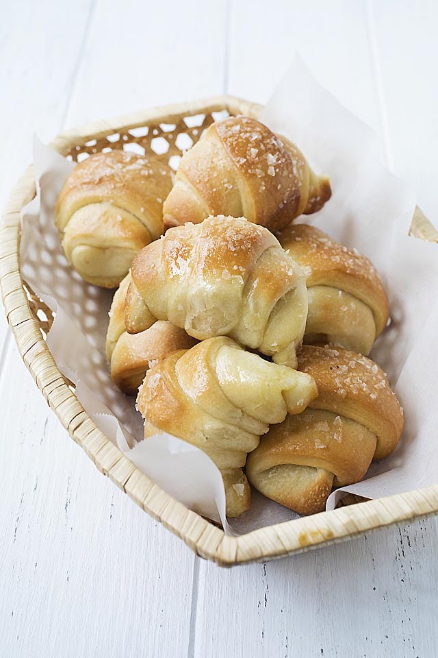 Delicious easy baked sea salt butter rolls served in a basket.