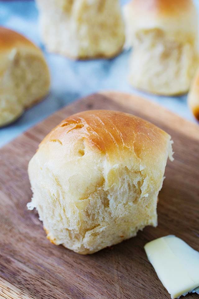 A dinner roll on a serving tray.