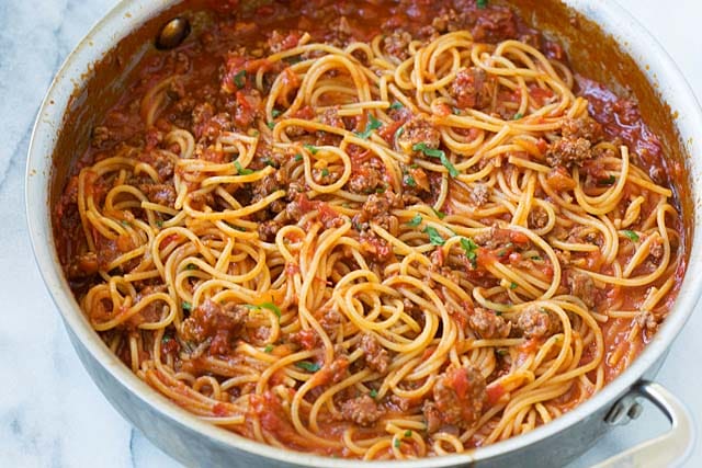 Make Spaghetti and meat sauce in a skillet on the stove top.