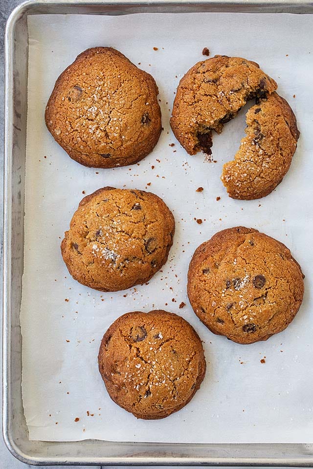 Chocolate chip cookies topped with flaky sea salts.