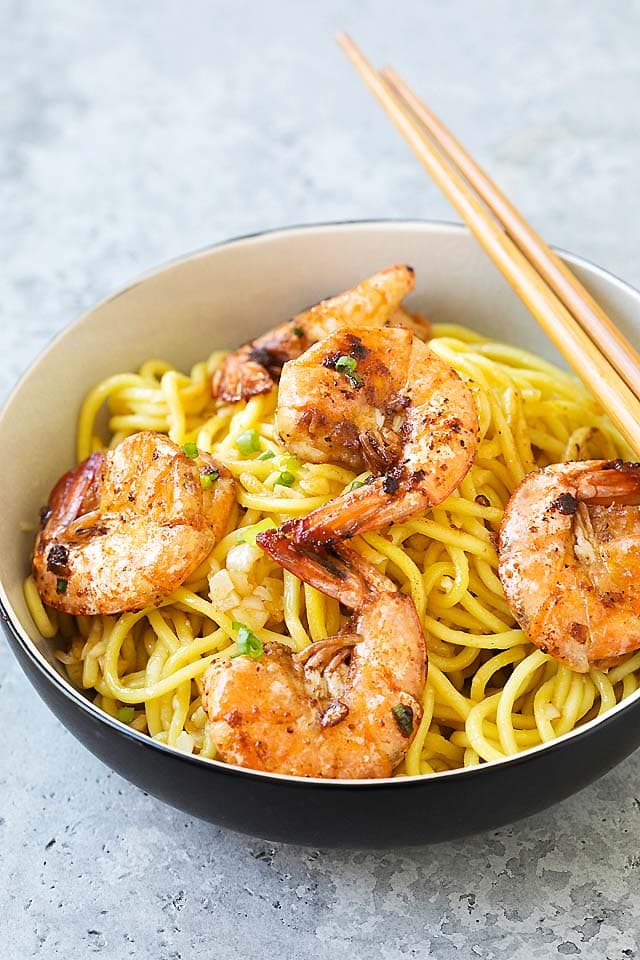 Easy and quick shrimp garlic noodles served in a bowl with chopsticks, ready to be served.