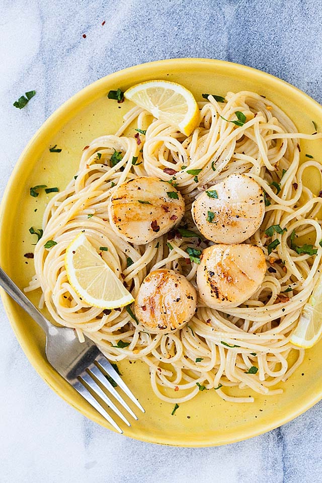 Creamy sea scallop pasta on a plate. 