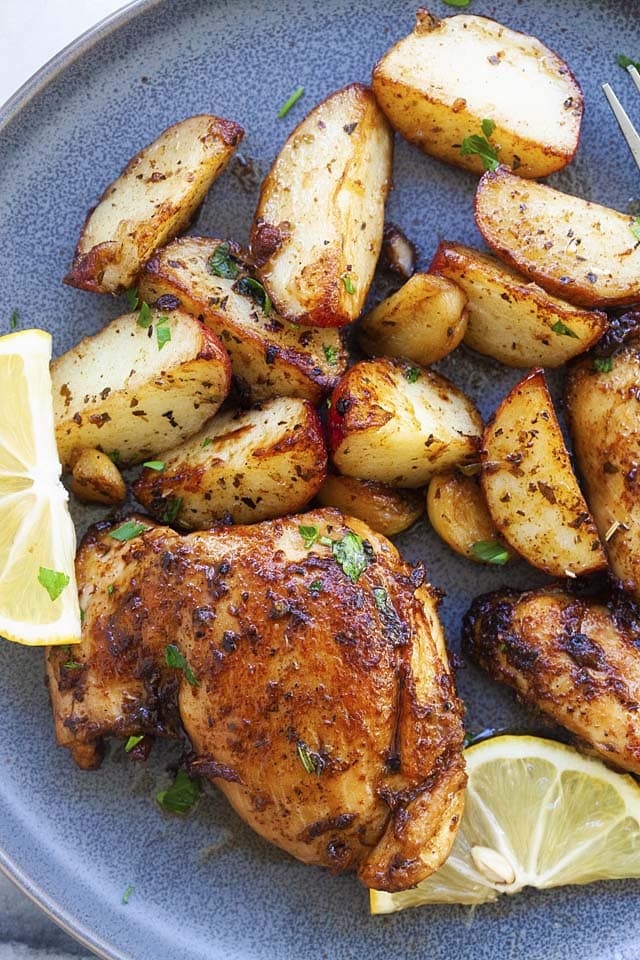 Close up photo of one pan chicken and potatoes, ready to be eaten.