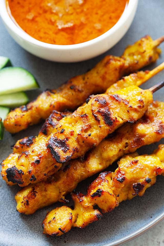 Perfectly grilled chicken satay with peanut sauce.