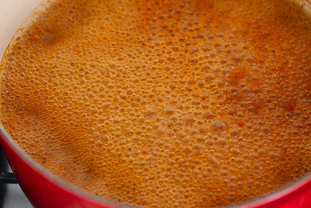 Boiling water with crawfish boil seasonings.