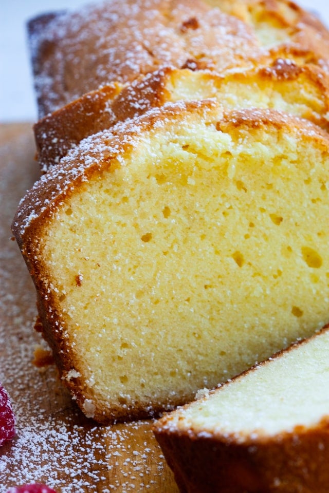 Close up of a piece of pound cake with cream cheese.