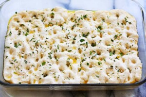 Add Focaccia toppings to Focaccia bread dough.