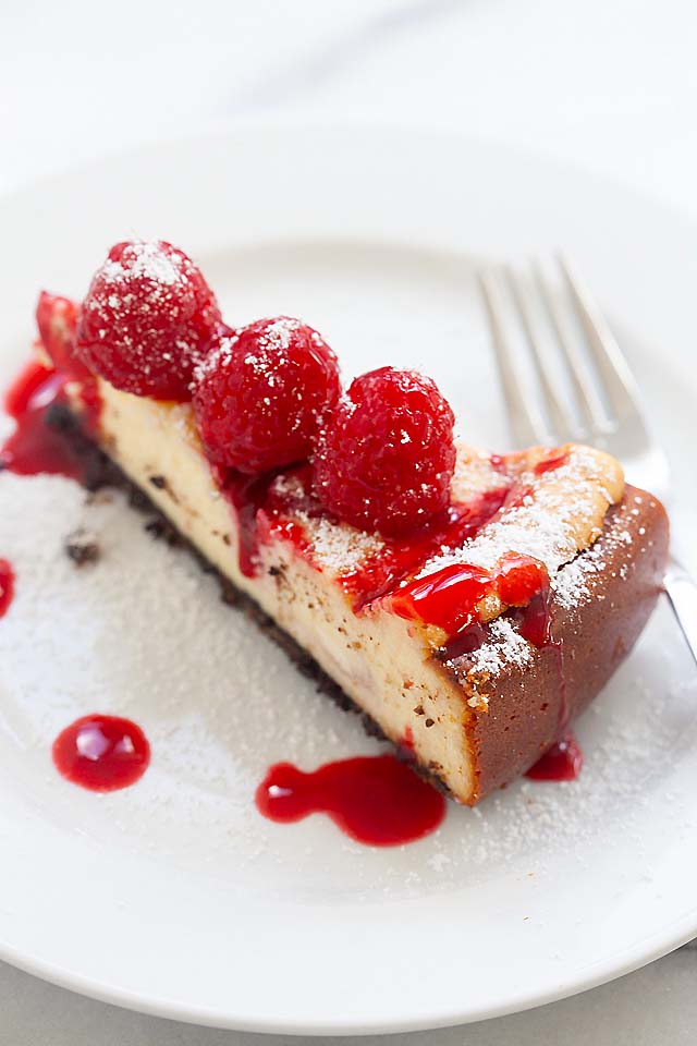 A slice of raspberry cheesecake just like Cheesecake Factory.