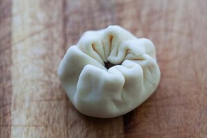 Wrapping char siu bao.