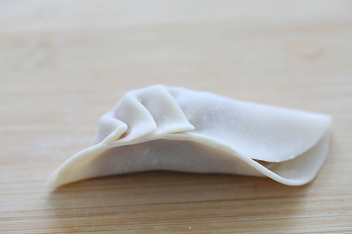 Wrapping Chinese dumplings.