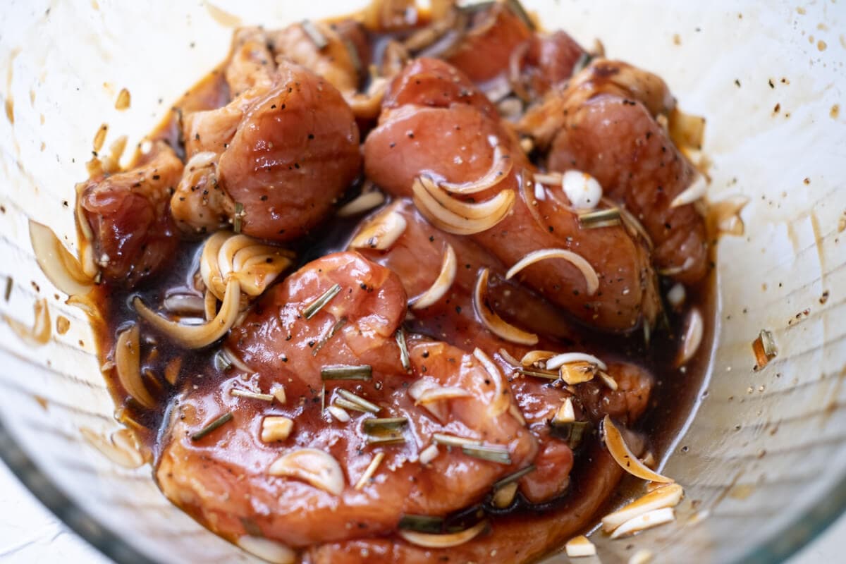 Pork with the marinade in a large bowl. 