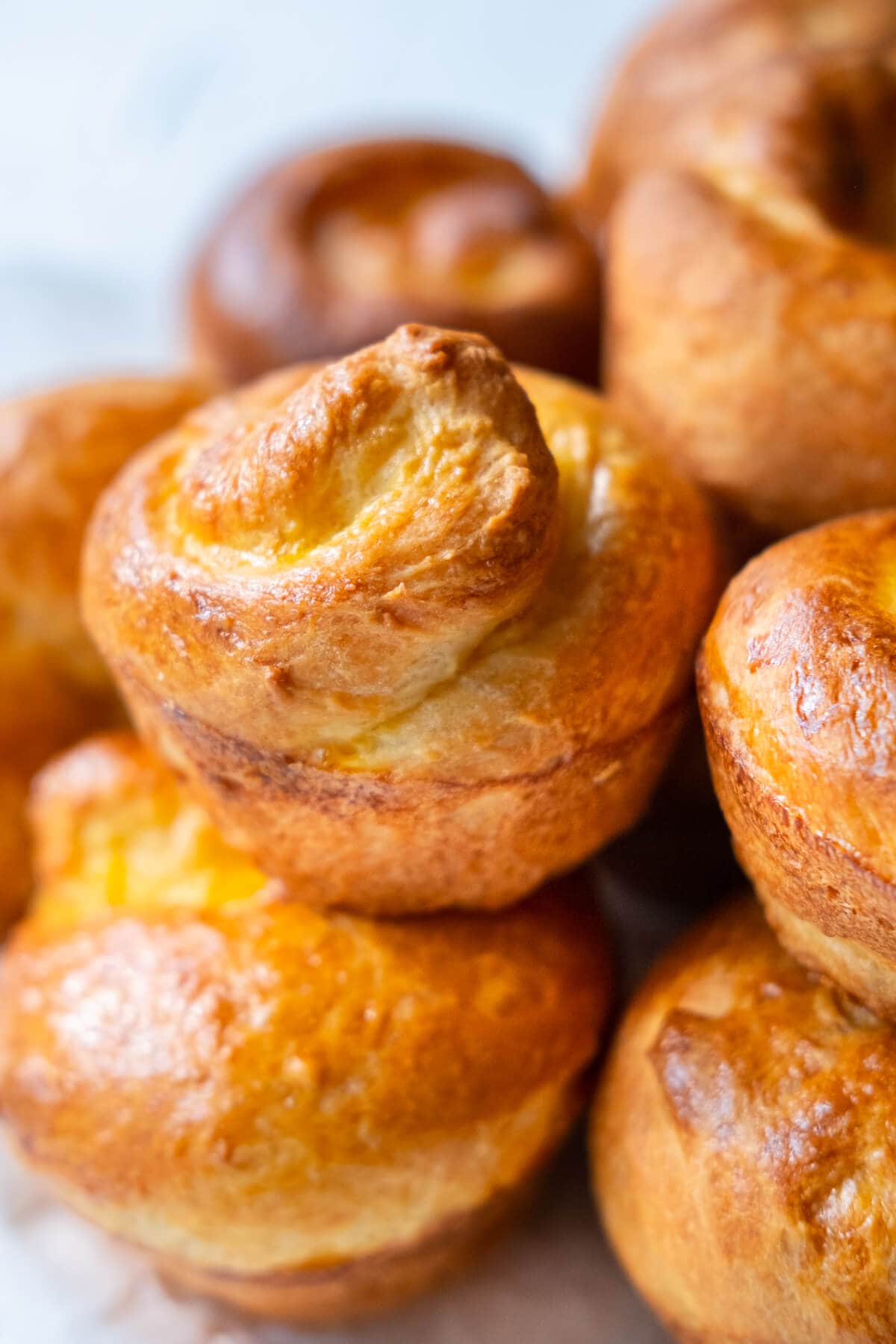 Quick and easy Brioche stacked together in a basket.