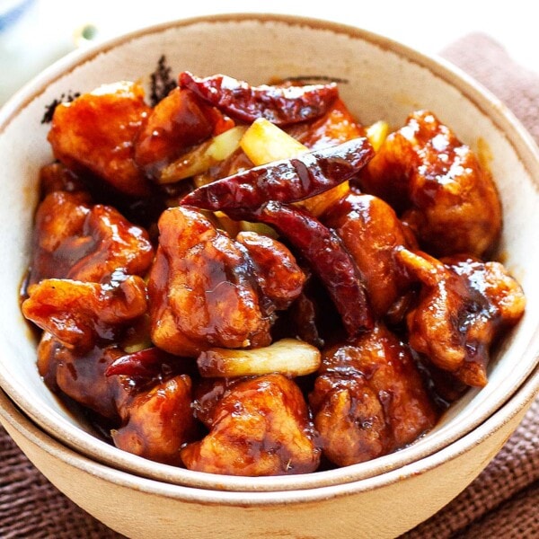 General Tso Chicken with delicious General Tso Sauce and red chilis in a bowl.