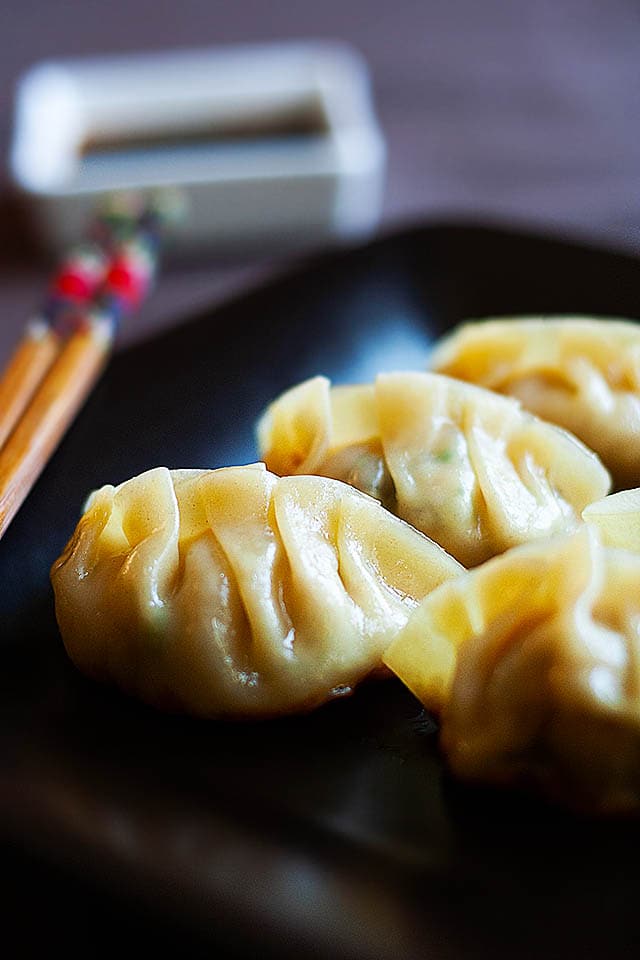 Gyoza dumplings with gyoza sauce.