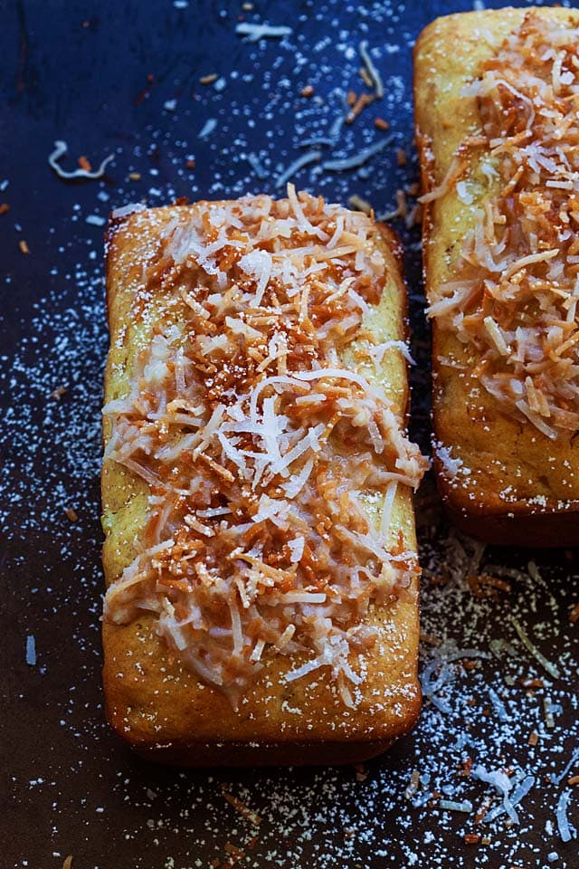 Loaf of Pina Colada quick bread with toasted coconut on top.