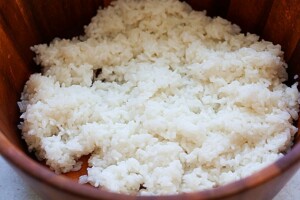 Sushi rice in a wood barrel.