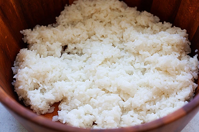 Perfect sushi rice in a wood barrel.