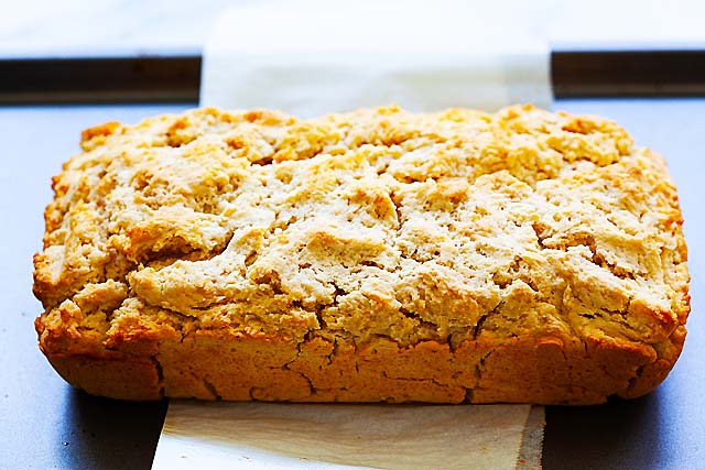 Easy beer bread made with beer bread mix of flour, melted butter, sugar and beer.