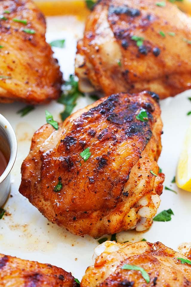 BBQ chicken thighs with perfectly charred and crispy skin.