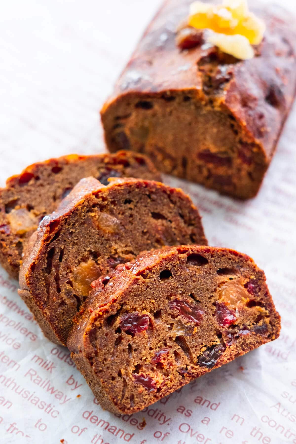 Christmas fruitcake recipe with brandy cut into slices. 