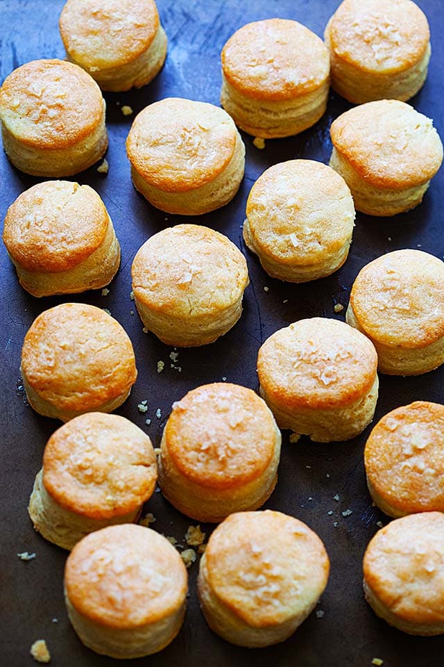 Homemade biscuits on a baking tray, fresh off the oven.