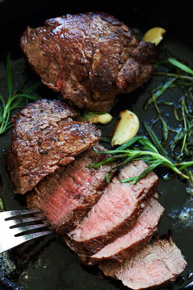 Filet mignon in a pan.