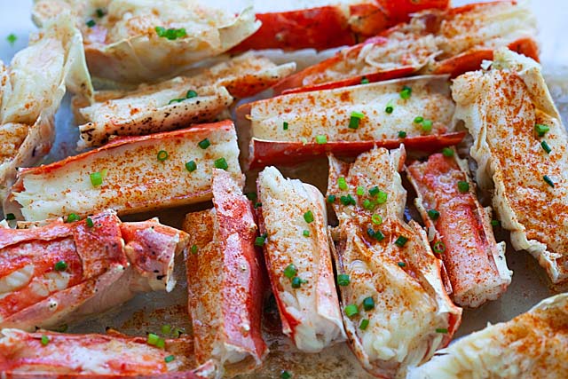 Baked king crab topped with paprika and chives.