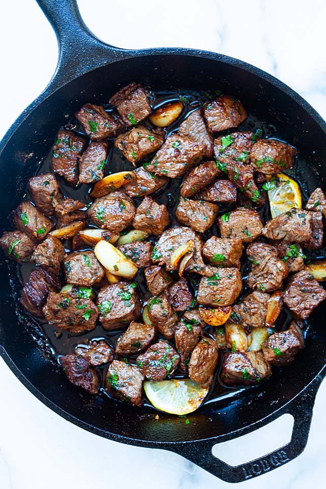 Steak bites in a skillet.