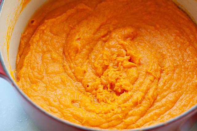 Mashed sweet potatoes in a saucepan. 