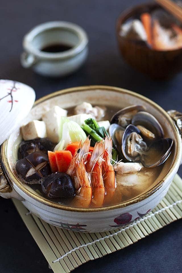 Nabe hot pot with tofu, chicken, fish, shrimp and vegetables.