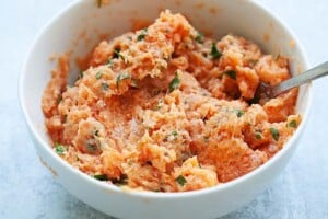 Salmon patties and salmon cakes ingredients in a bowl.