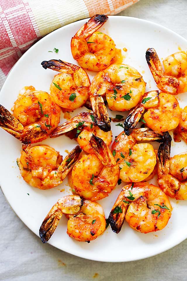 Grilled shrimp on a plate.