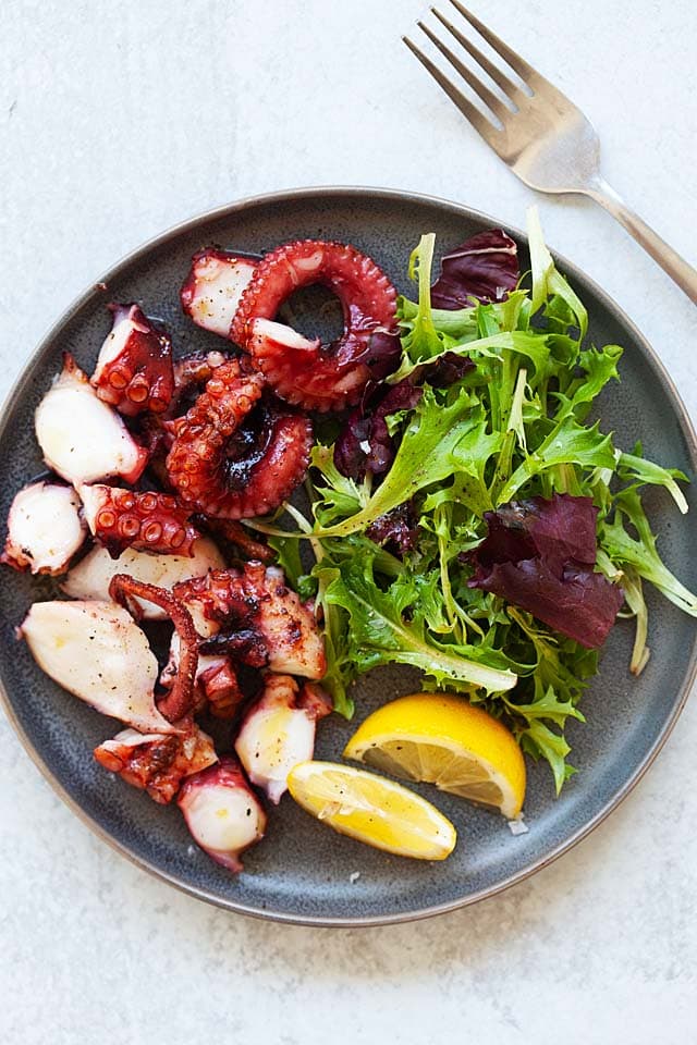 Grilled octopus on a plate.