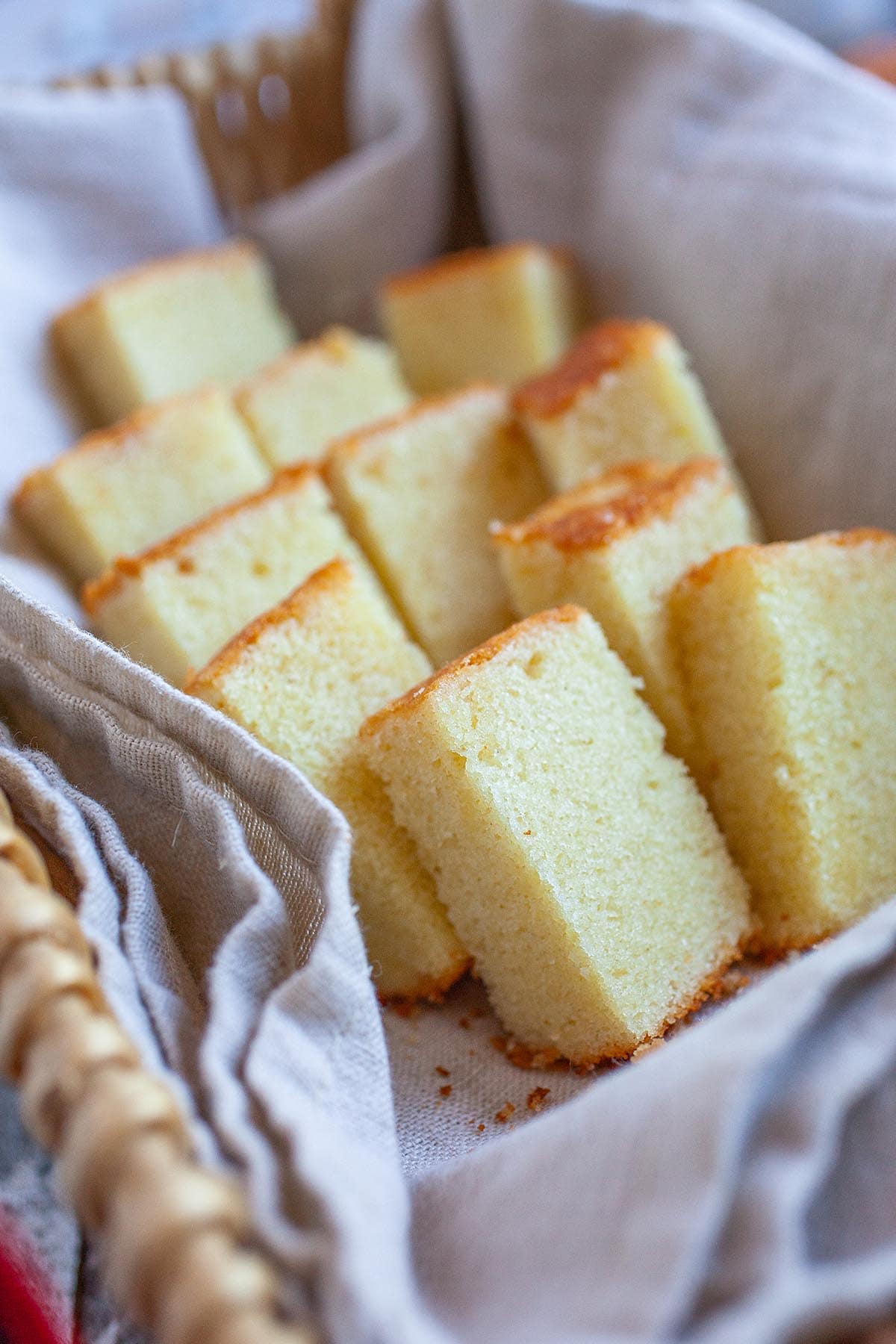 Slices of butter cake in a basket.