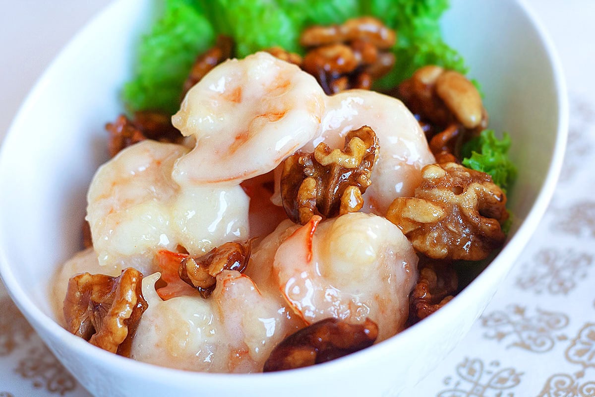 Sweet mayo coated honey walnut shrimp with roasted walnuts. 