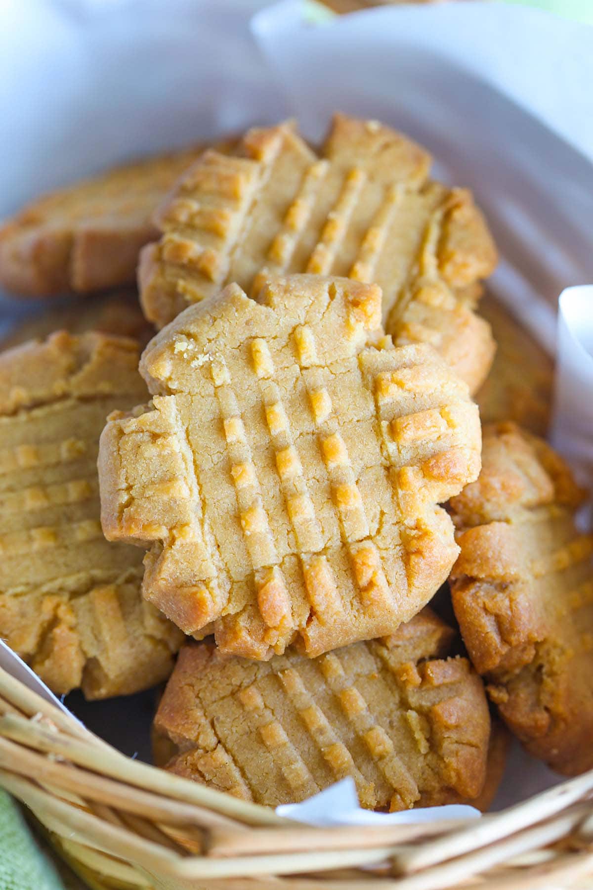 Peanut butter cookies in a baking tray.